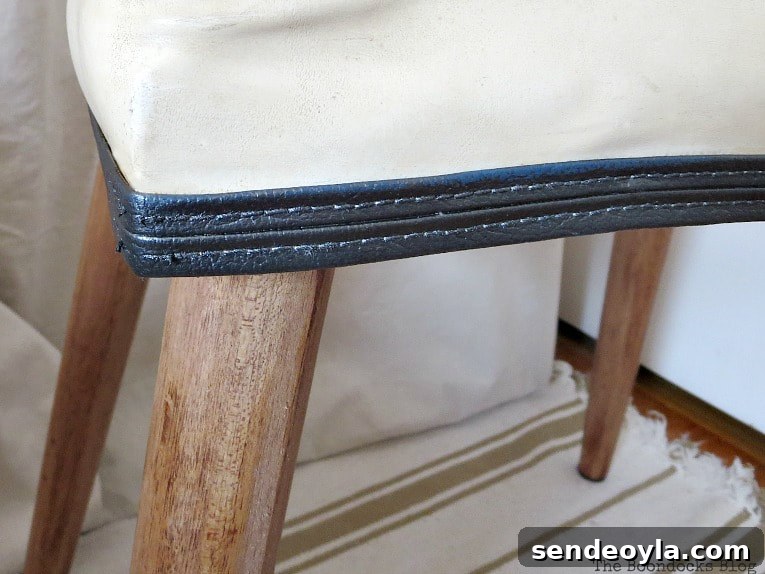 DIY Wooden Stool Makeover: Transform It Into a Chic Seat 11 Closeup of painted vinyl piping
