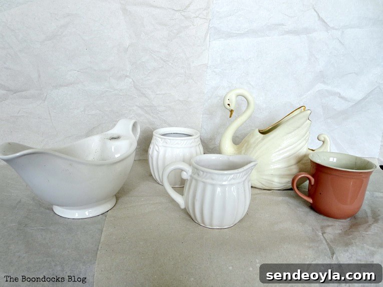 DIY Upcycled Planters from Household Items 4 Household items used as planters including a cup, gravy bowl, and ceramic swan