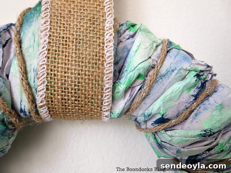 Adding burlap ribbon added for hanging.
