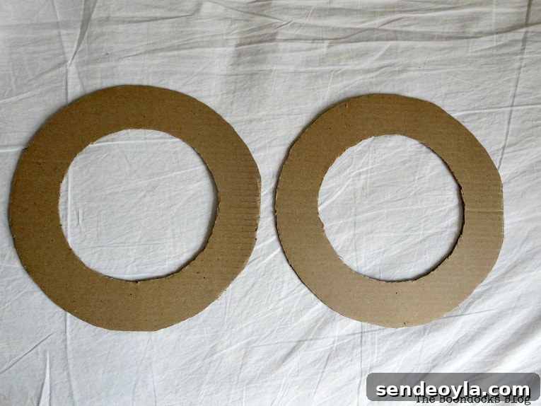 2 donut shaped card board pieces.