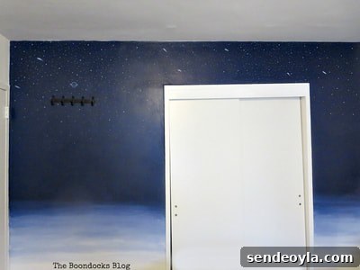 Refinish and Restore a Campaign Dresser in 7 Steps 17 Blue painted wall.