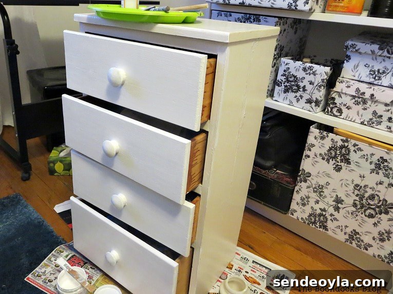 Start of the nightstand makeover, white painted front.