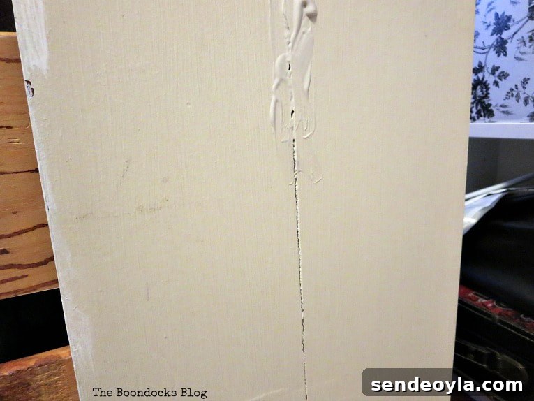 Adding wood reclaim to the cracked side of nightstand.