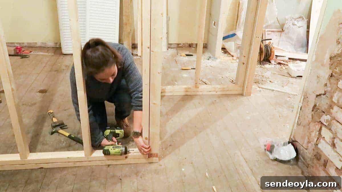 How to Build a Partition Wall: Step-by-Step DIY Guide 11 Mounting one partition wall to another