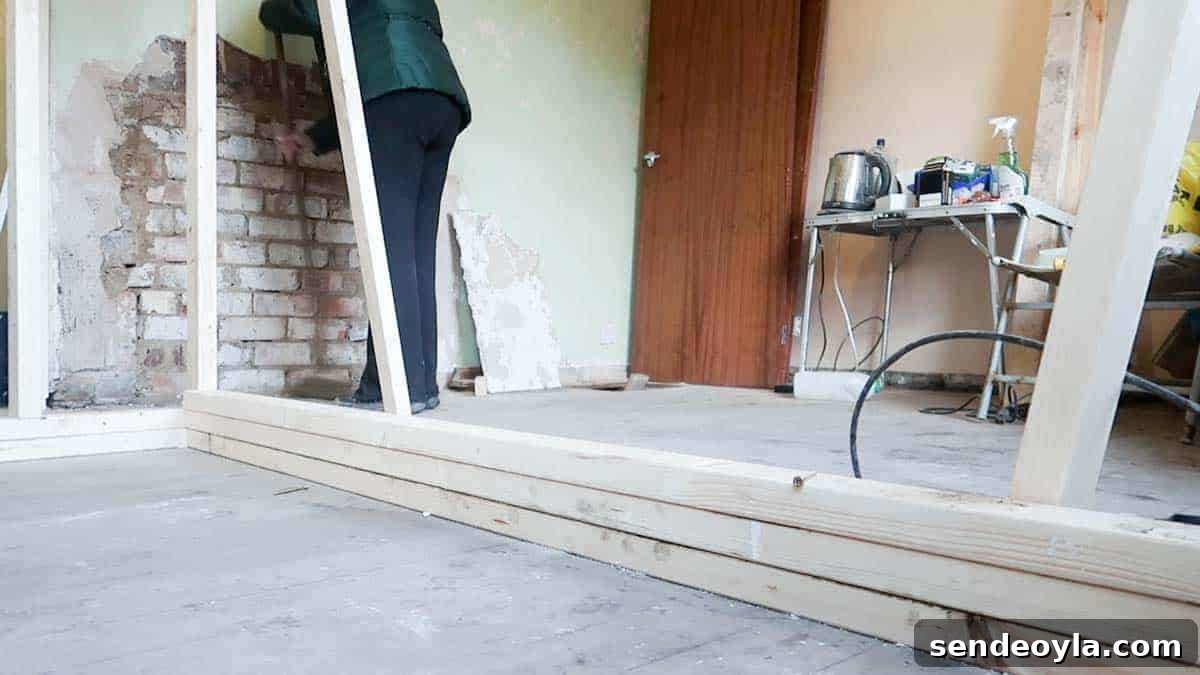 How to Build a Partition Wall: Step-by-Step DIY Guide 6 C16 timber stacked to create a stud wall