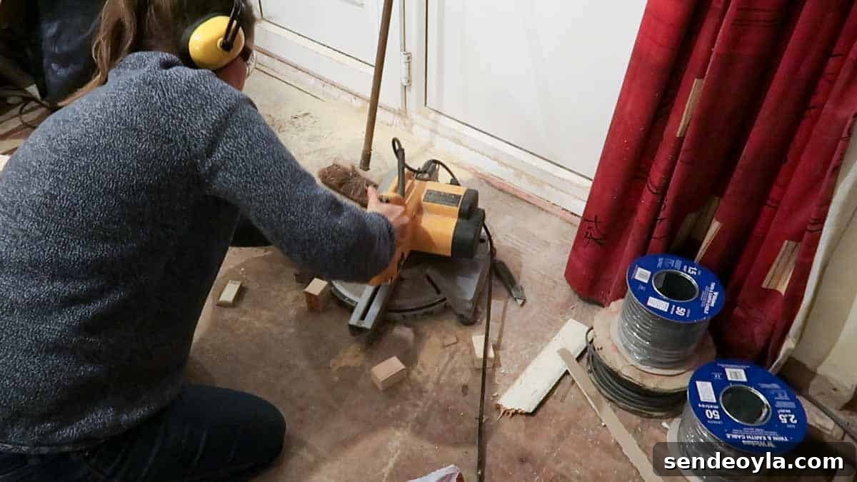 How to Build a Partition Wall: Step-by-Step DIY Guide 8 Cutting battens to length with a DeWalt chop saw