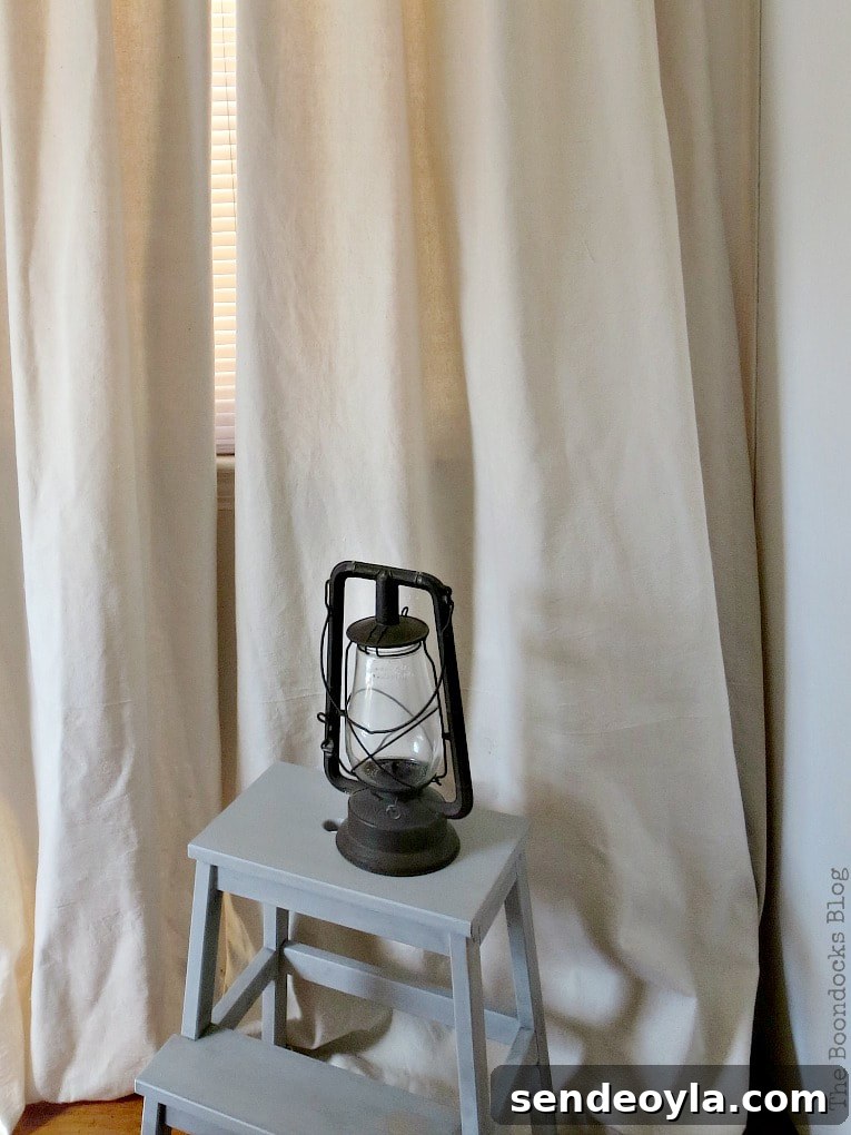 DIY Pleated Drop Cloth Curtains: Step-by-Step Guide 10 Drop cloth curtains with extra length for puddling