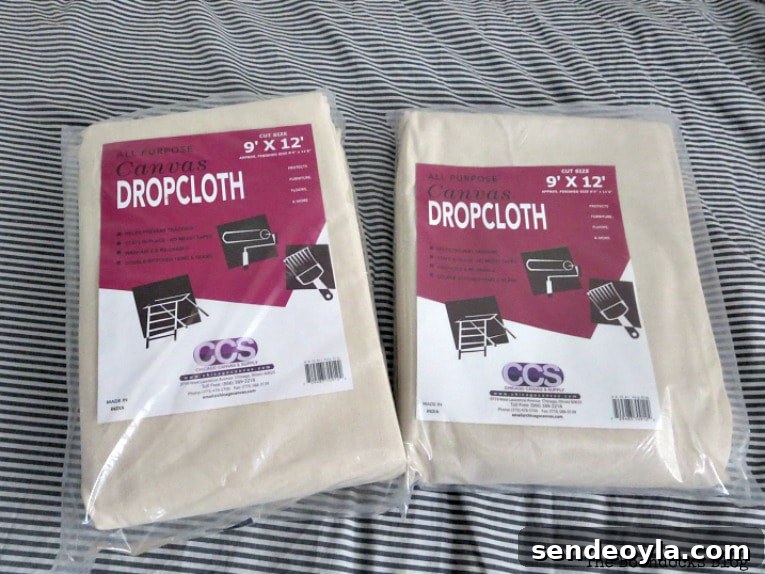 DIY Pleated Drop Cloth Curtains: Step-by-Step Guide 4 Drop cloth fabric laid out for measuring