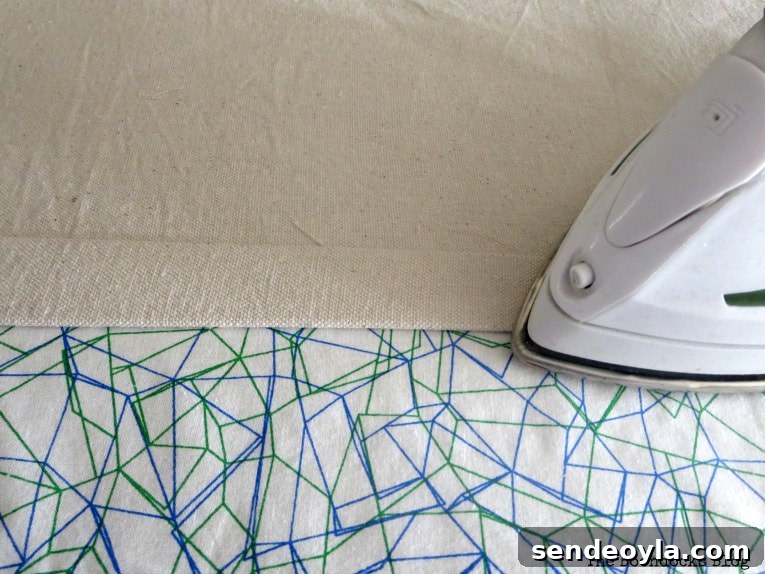 DIY Pleated Drop Cloth Curtains: Step-by-Step Guide 5 Hemming and pressing the drop cloth edges
