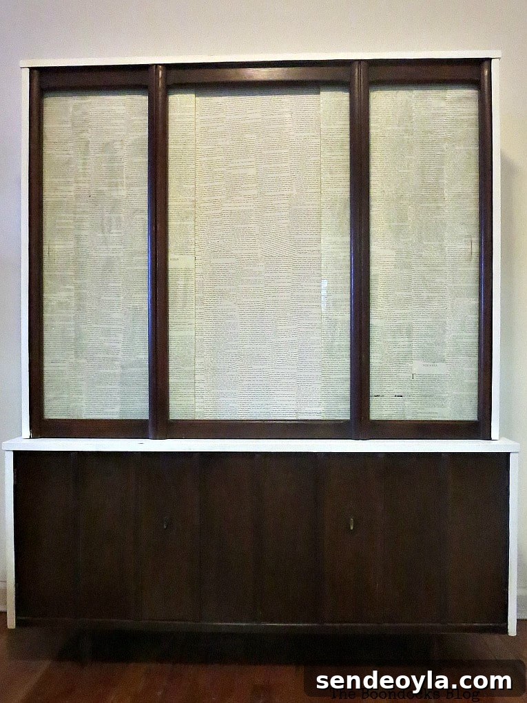 Finished makeover on the mid century modern china cabinet.