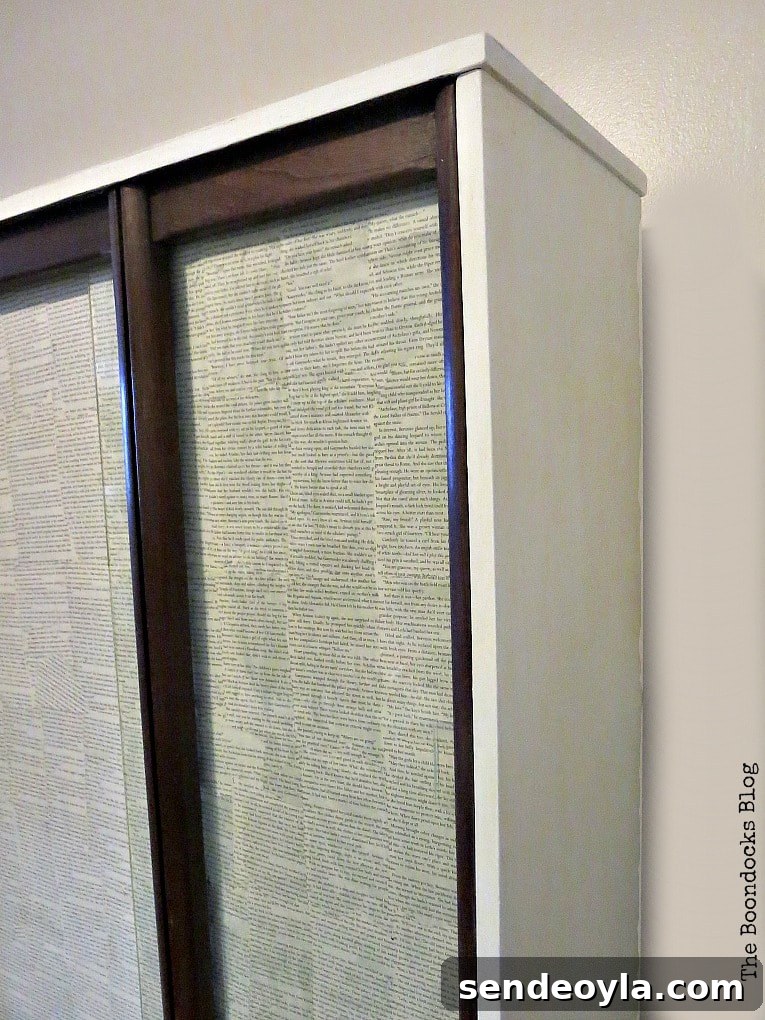 Side of the upper cabinet painted white.