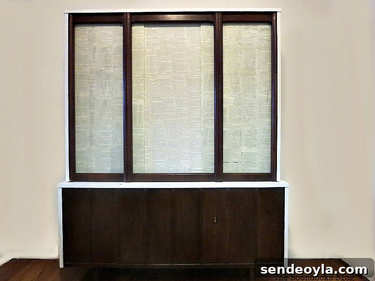 Finished makeover on the mid century modern china cabinet.