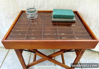 Table made from director's chair and cassette tape holder