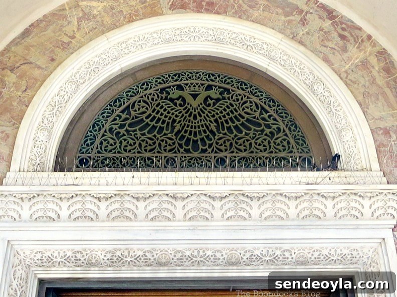 Saint Andrew's Cathedral: History, Architecture and Highlights 10 Detail above the main door showing the two-headed eagle