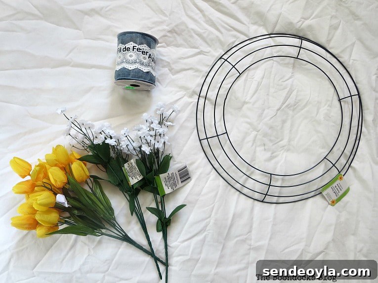 wreath form, flowers and blue ribbon