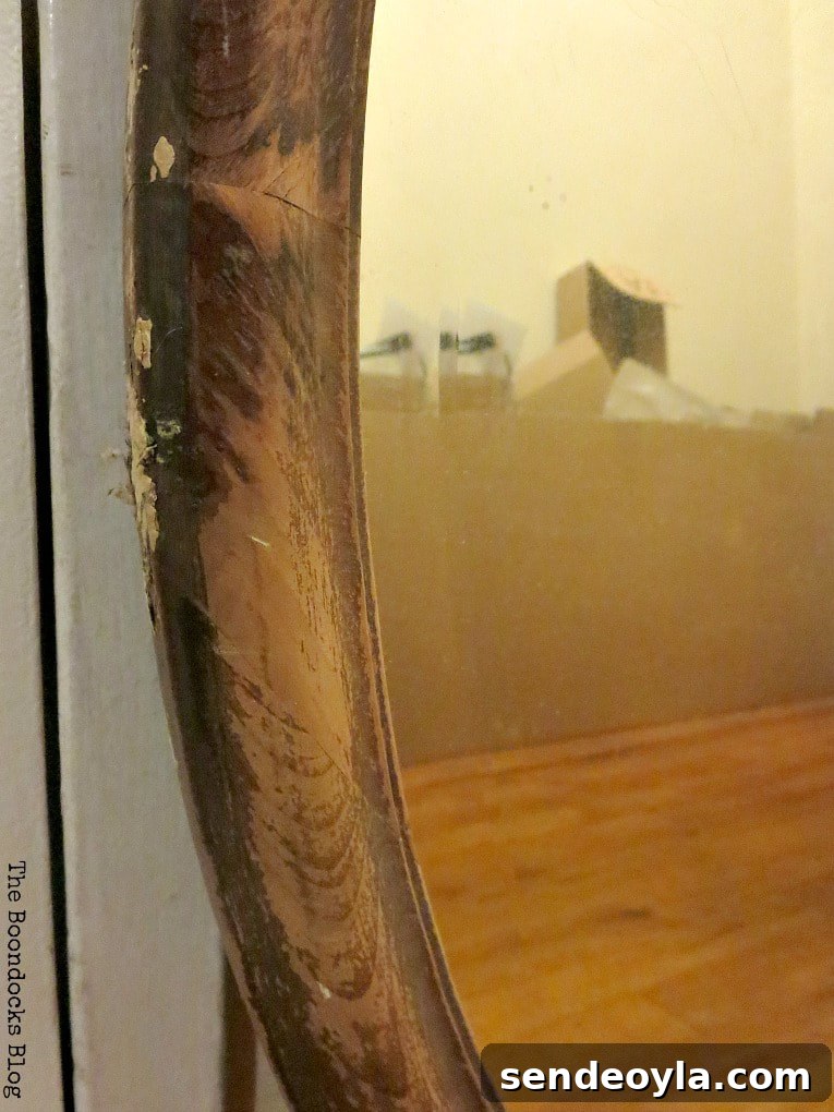 Detail of scratched mirror, How to Revive an Old Wood Mirror with Paint www.theboondocksblog.com