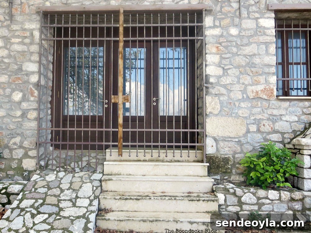 Wooden door with gate in front, Celebrating a 3 year Blogoversary with Lots of Doors