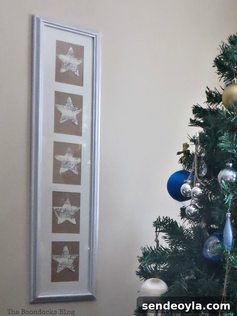 Quick Spring Art Ideas to Refresh Your Home 8 A picture frame with five openings and musical stars next to a Christmas tree.