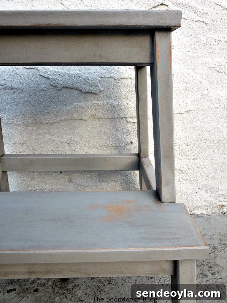Close up of the distressed step stool.
