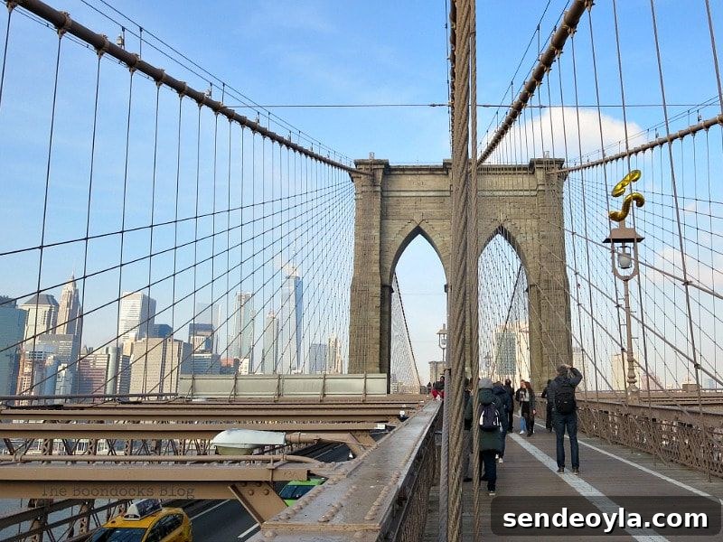 Walking the Brooklyn Bridge: Highlights, Tips and Photo Spots 18 Past the Towers of the Brooklyn Bridge, A Tour of the Astonishing Brooklyn Bridge Walkway www.theboondocksblog.com