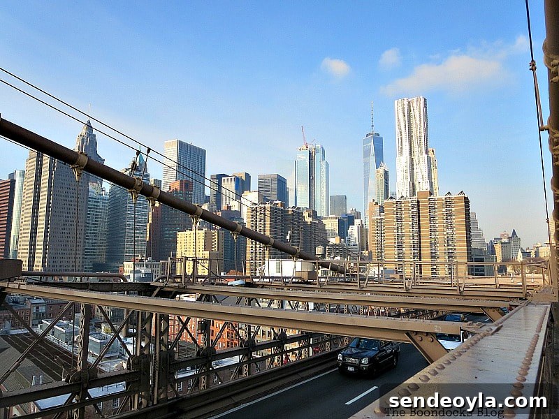 The financial district with one world trade center in the rear, A Tour of the Astonishing Brooklyn Bridge Walkway www.theboondocksblog.com