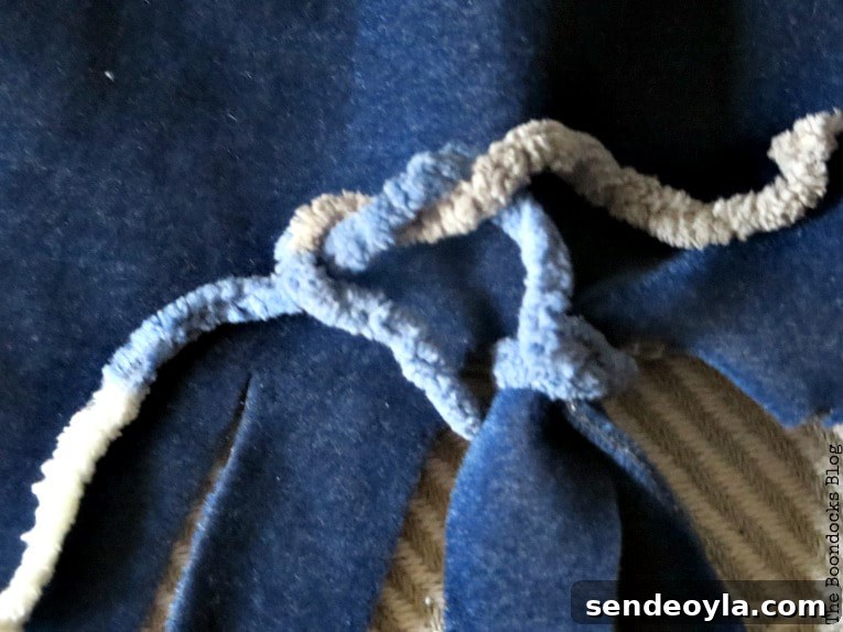 tying it again, How to easily transform a blanket with yarn