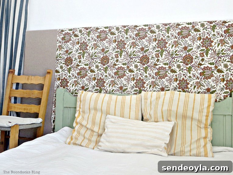 DIY Clothes Rack Cover: Step-by-Step Guide 13 Close up of flower fabric headboard.