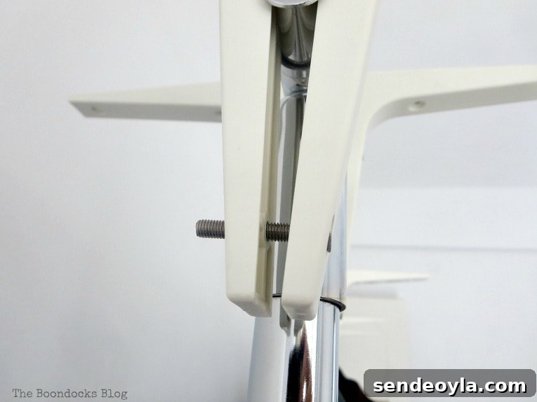DIY Clothes Rack Cover: Step-by-Step Guide 4 Shelf bracket screwed into the top of the clothing rod.