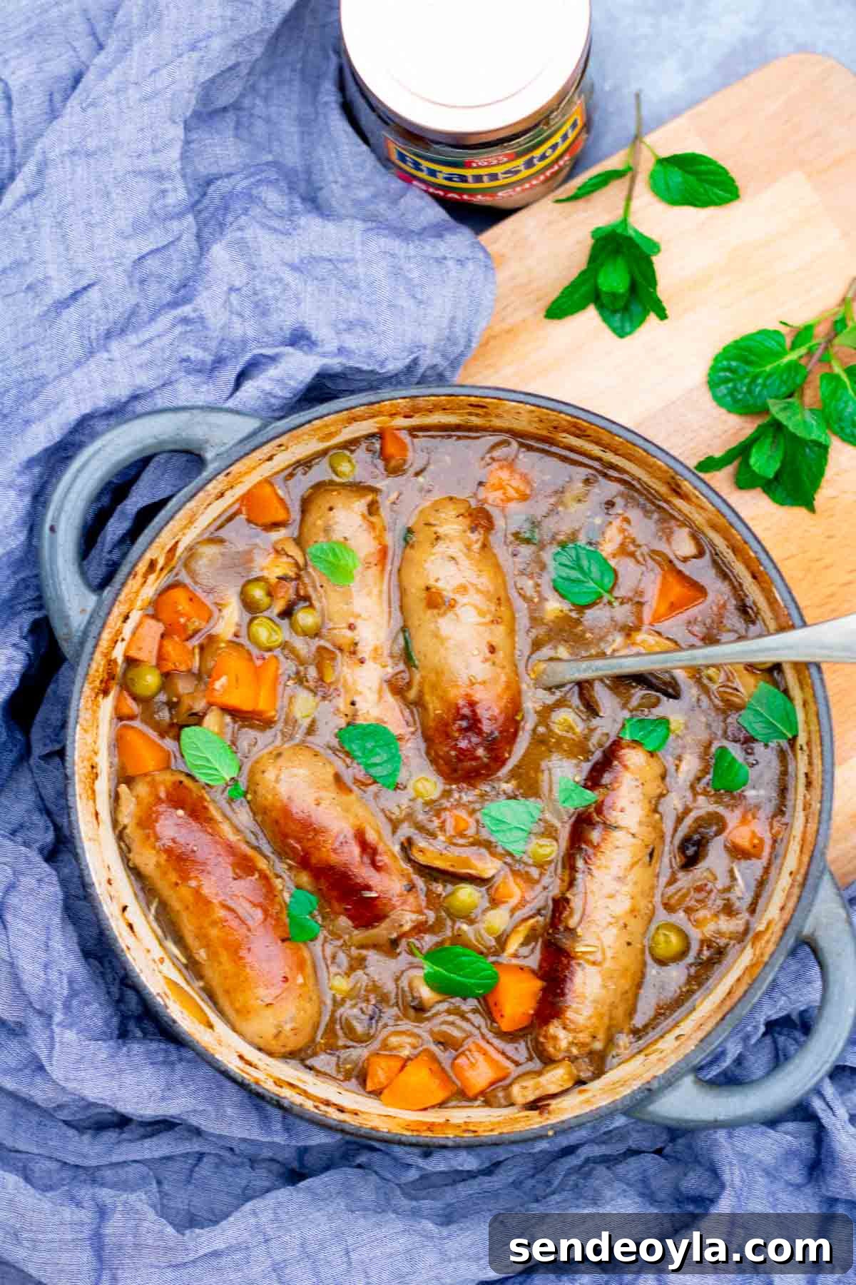 Branston Pickle Sausage Casserole Recipe 2 Denby Halo dish full of spicy sausage casserole with Branston pickle