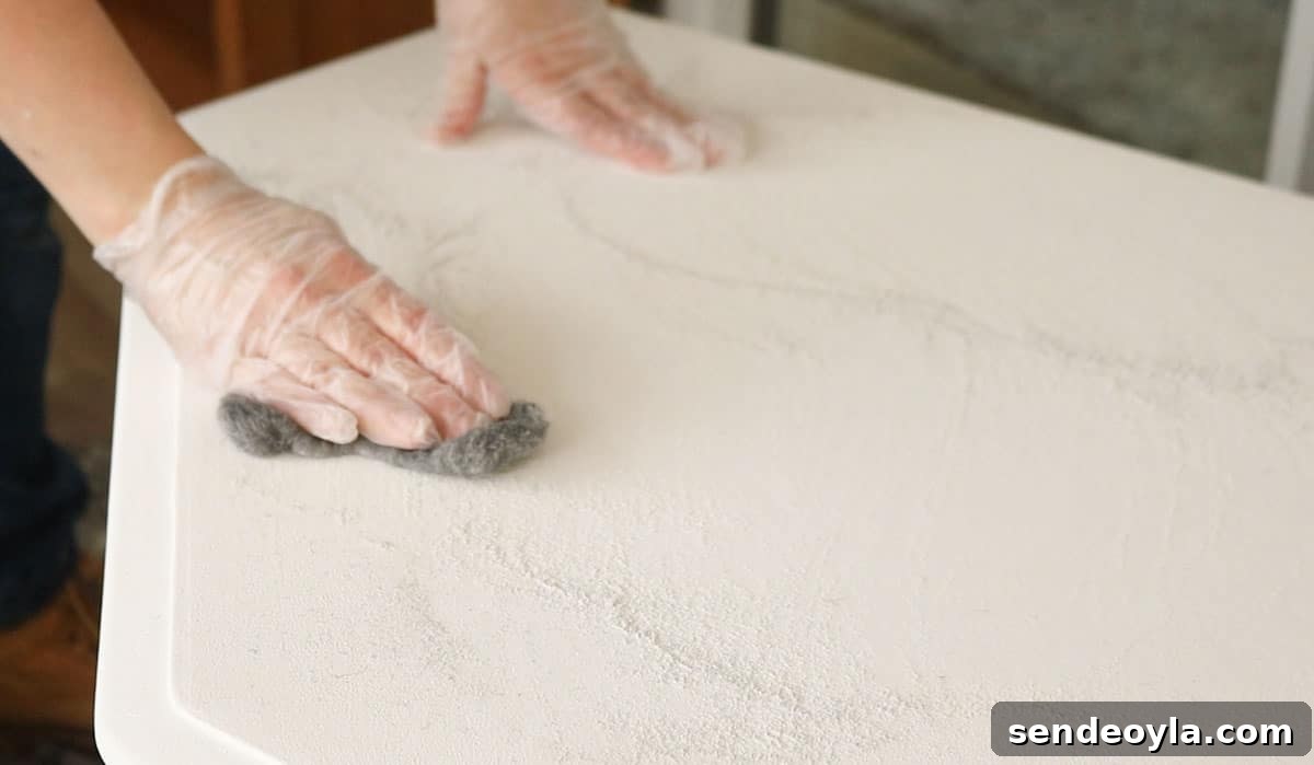 distressing chalk paint with fine wire wool
