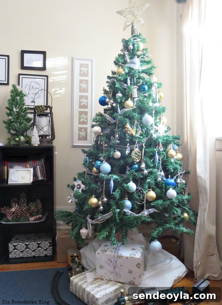 Blue, silver and gold Christmas tree with thrifted, repurposed and upcycled ornaments
