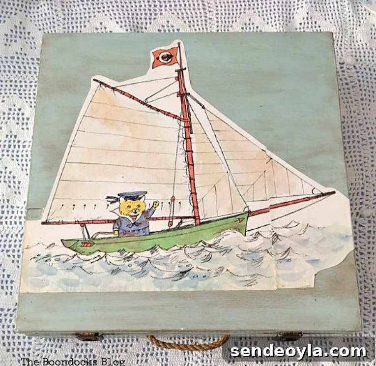 Top of the box with decoupage and brown wax