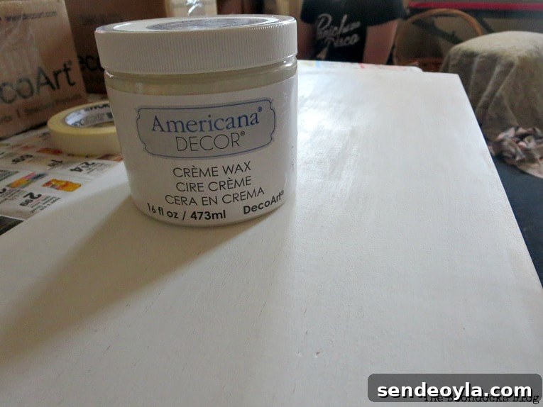 DIY Farmhouse Coat Rack for Your Entryway 4 Finishing the wood with cream wax, How to Make a Wooden Wall Hanger www.theboondocksblog.com