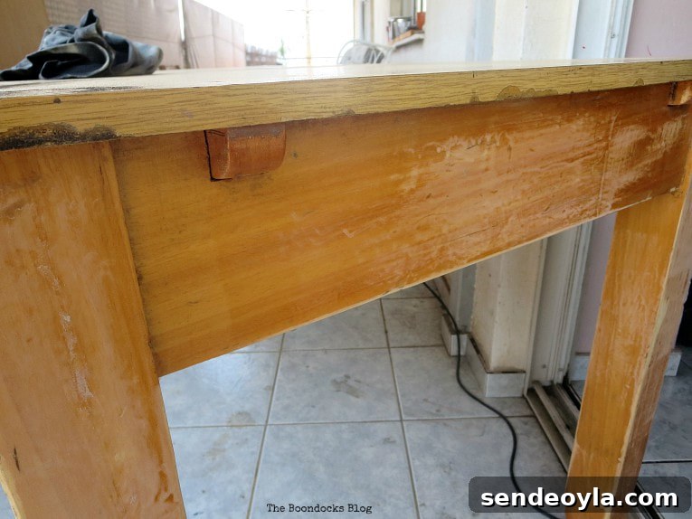 Table in poor condition before refinishing