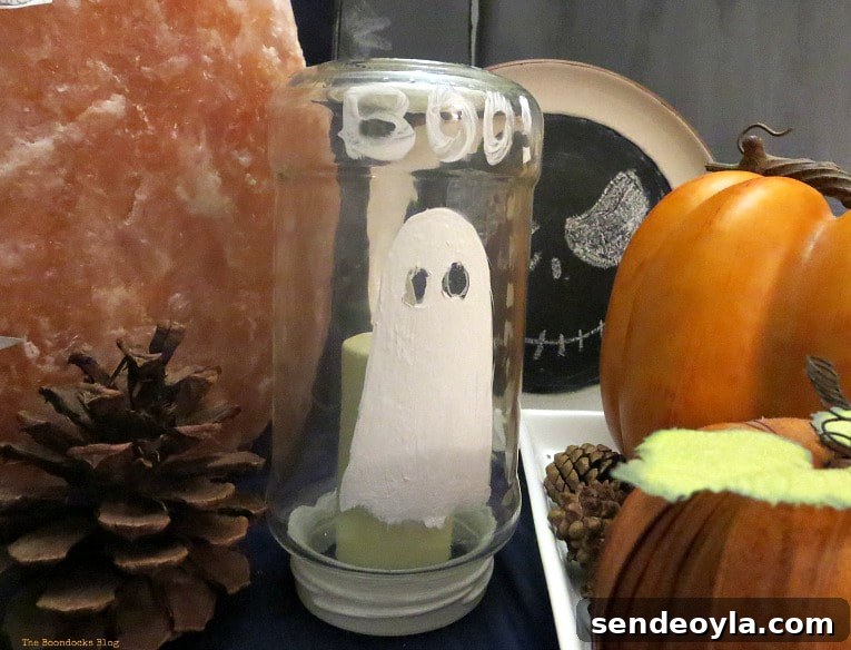 Glass jar painted with a ghost