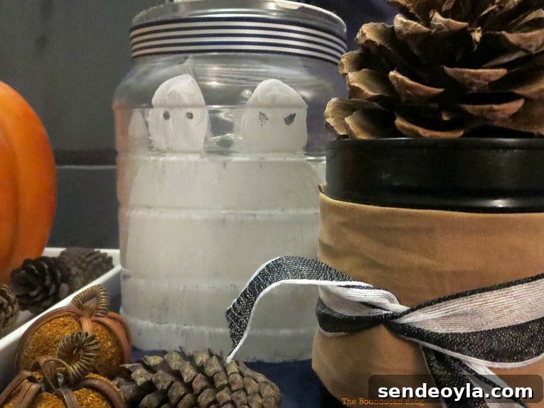 Plastic jar with painted ghosts
