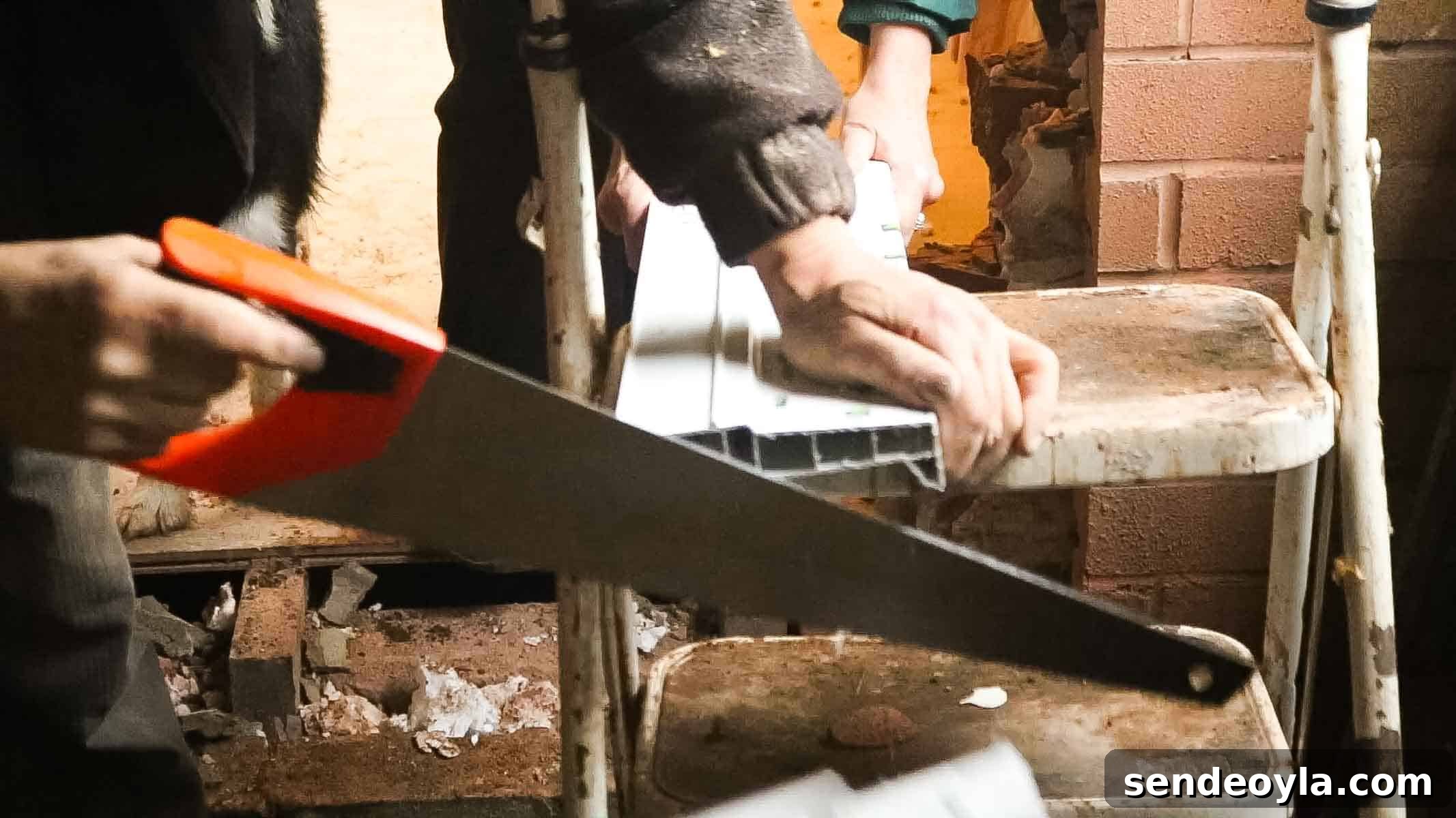Cutting UPVC sil with a hand saw