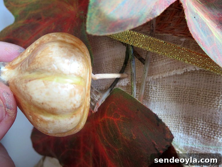 How to Turn a Dollar Store Vine into a Fall Wreath 12 toothpick pushed into cardboard