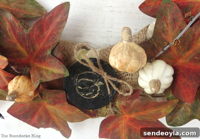 How to Turn a Dollar Store Vine into a Fall Wreath 13 adding random stems