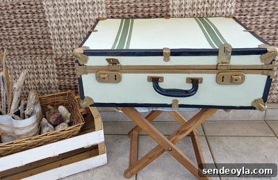 Upcycle Broken Plastic Baskets into Fabric Storage Bins 18 Vintage suitcase used as storage.