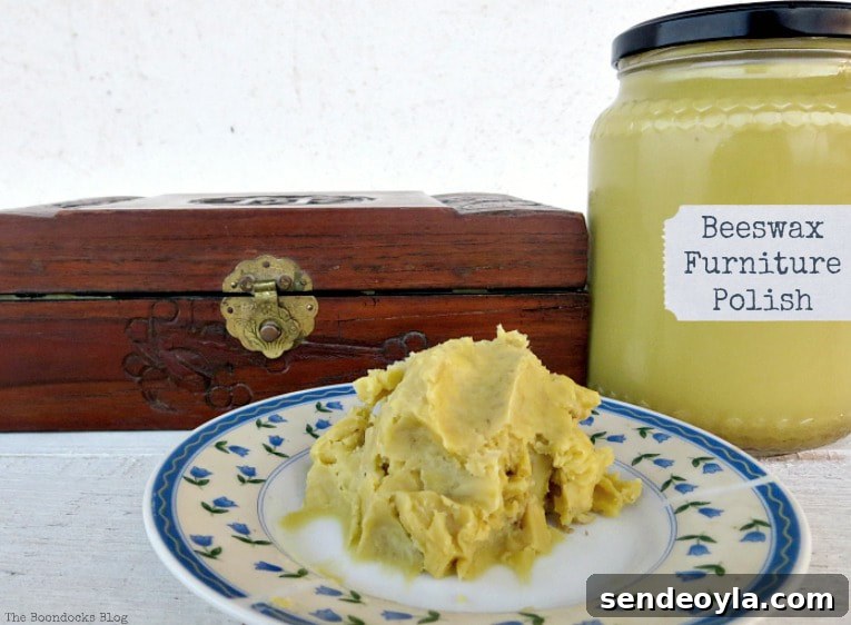 DIY Beeswax Furniture Polish Recipe and Care Tips 2 Wood box, beeswax furniture polish in a jar and on a plate.