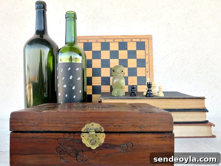 DIY Beeswax Furniture Polish Recipe and Care Tips 13 Polished wooden box placed with books, a chess set, chess pieces and empty wine bottles.