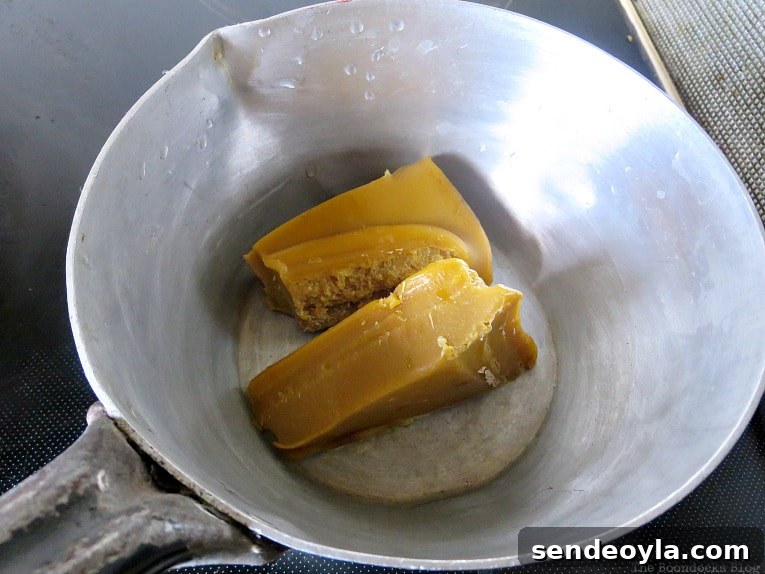 DIY Beeswax Furniture Polish Recipe and Care Tips 6 Beeswax in a pot ready to be melted.