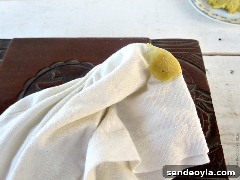 DIY Beeswax Furniture Polish Recipe and Care Tips 10 Beeswax furniture polish on cotton cloth.