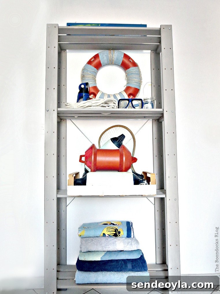 How to Paint and Upgrade an IKEA HEJNE Shelf 11 Ikea Hejne shelf painted and decorated with nautical themes.