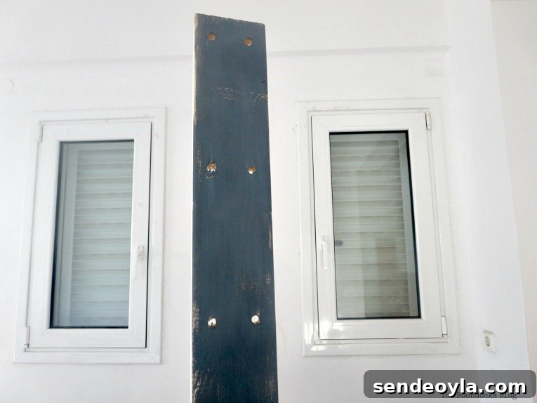 How to Paint and Upgrade an IKEA HEJNE Shelf 6 Painting a wooden panel with grey paint.