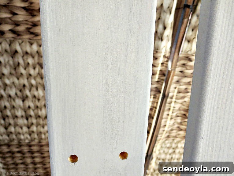 How to Paint and Upgrade an IKEA HEJNE Shelf 8 Painted wood with streaks of white paint.