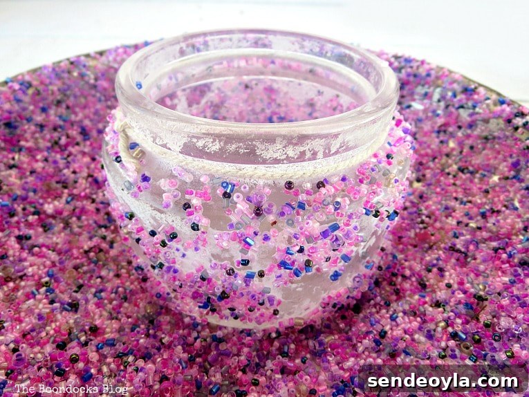 Upcycling Vintage Copper Pots: Mistakes to Avoid 9 Adding a bead covered jar onto the copper pot.