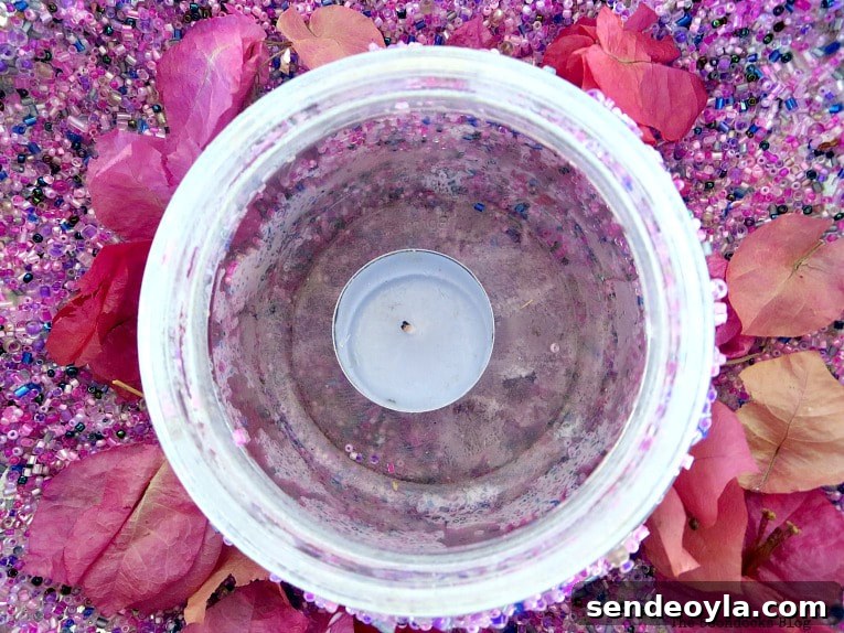 Upcycling Vintage Copper Pots: Mistakes to Avoid 10 Adding flowers and a tea light.