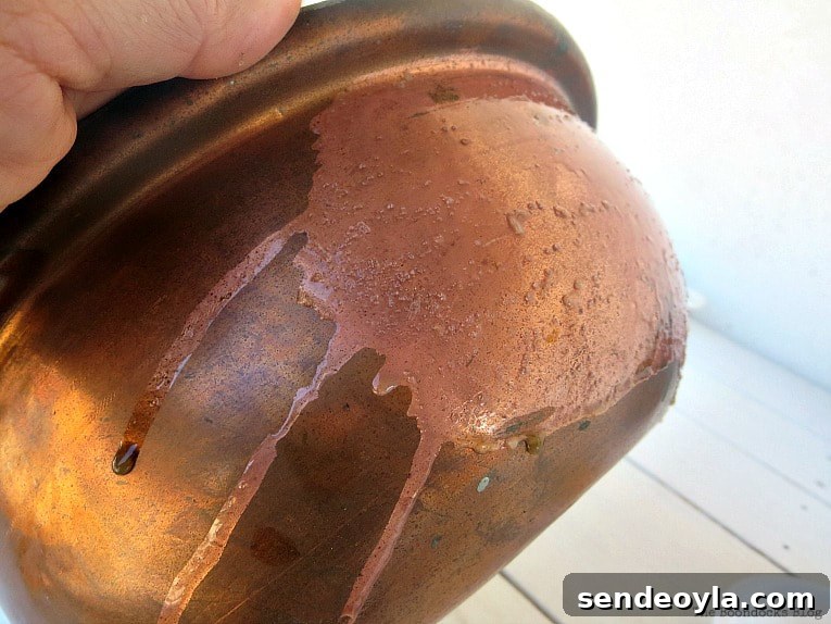 Upcycling Vintage Copper Pots: Mistakes to Avoid 6 Cleaning the vintage copper pot with a lemon and salt mixture.